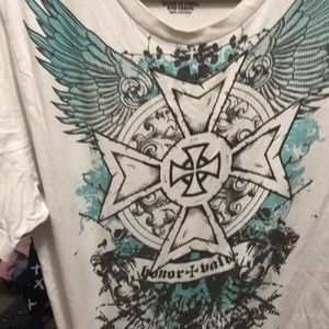 White shirt with a cross on it
